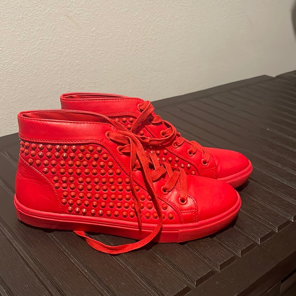 Red sneakers studded